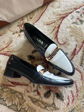 Prada Black and White Leather Loafers with Gold Chain